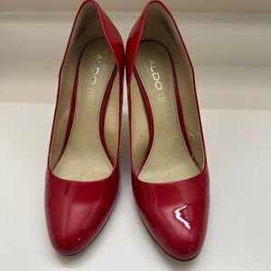 Red patent heels